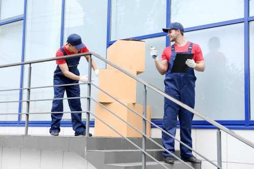 Commercial moving team planning an office relocation in Ham