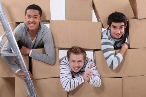 Unpacking household items in a Ham property after moving day