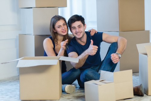 Packed office boxes and furniture prepared for a business move