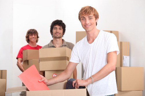 Packing boxes and furniture for a home removal in Ham